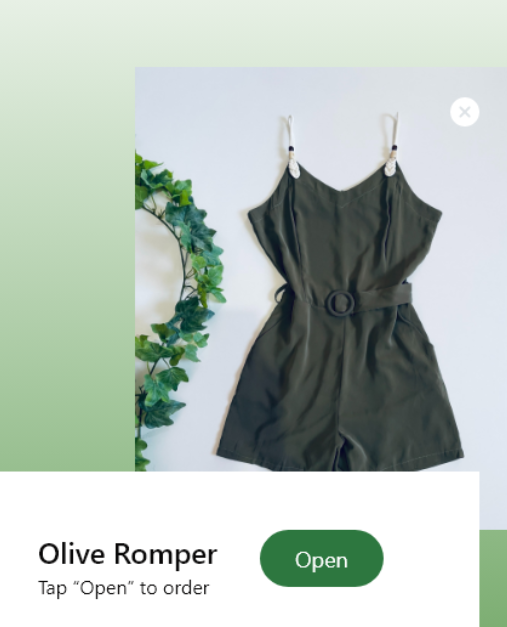 Screenshot of an app design for buying items after scanning their barcode. Screen shows an olive romper, with a label and a button that says "open"